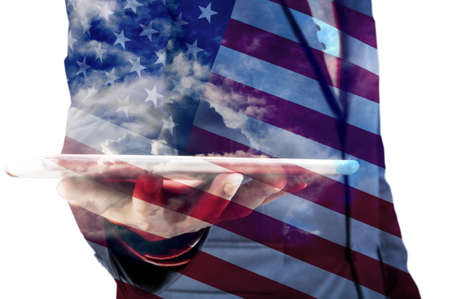Double Exposure of Businessman with Cloud and America Flag as American Election or Politic conceptの写真素材