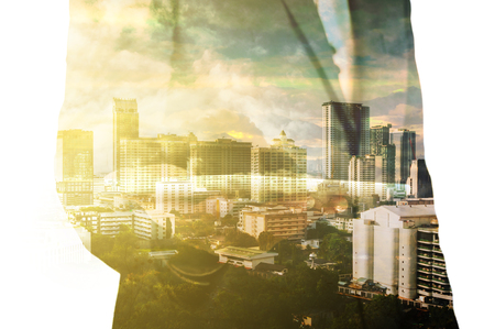 Businessman with Tablet and City of Bangkok, double exposure as Real Estate Development Conceptの写真素材