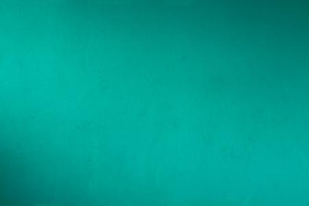 Dirty Grunge Green Cement or Concrete Wall as Texture Backgroundの写真素材
