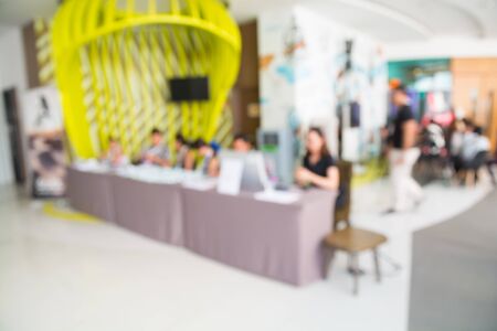 Abstract blur Background of Registration Desk at Business Seminar Meeting with Staff in Hotel as Conference Event concept の写真素材