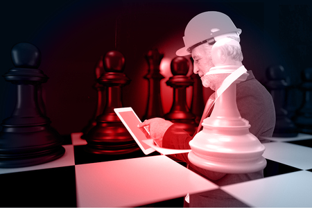 Double Exposure of Senior Architect or Businessman hold Digital Wireless Tablet with Black and White Chess on Chess board as Business Strategy Concept.の写真素材