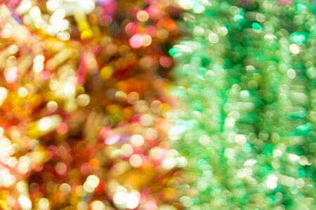 Abstract Blur Defocus Bokeh Background or Christmas Decoration Items, Christmas tree and Reflection Paper, in Supermarket or Department Store or Shopping Mall on Weekend.の写真素材