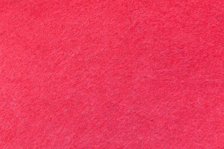 Texture background of red velvet or flannel as backdrop or wallpaper pattern for decorationの写真素材