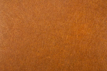 Texture background of Light Brown velvet or Orange flannel Fabric as backdrop or wallpaper pattern for decorationの写真素材