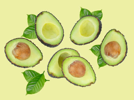 Avocado top vview  isolated on green background