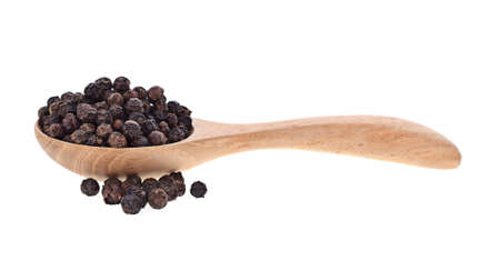 black pepper corns isolated on white backgroundの写真素材