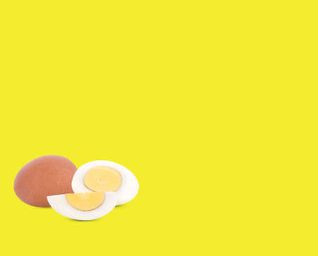 boiled eggs on a yellow backgroundの写真素材
