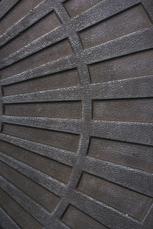 The old bin cover on street to good background texture.の写真素材
