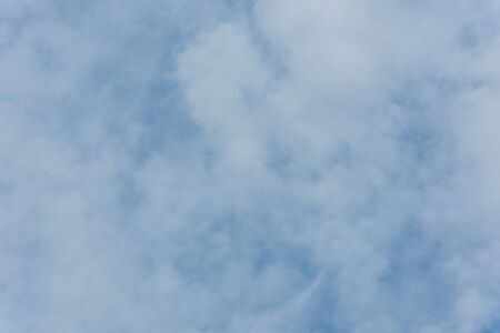 Blue sky background with partly cloudyの写真素材