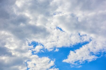 Blue sky background with partly cloudyの写真素材