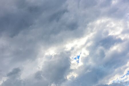 Blue sky background with partly cloudyの写真素材