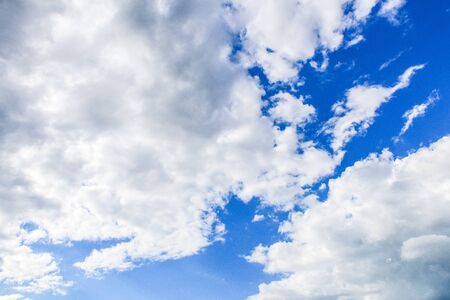 Blue sky background with partly cloudyの写真素材