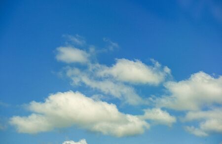 Blue sky background with partly cloudyの写真素材