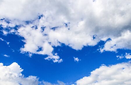 Blue sky background with tiny clouds, clouds in the blue skyの写真素材