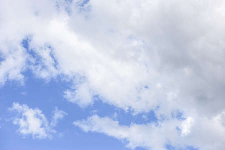 Blue sky background with tiny clouds, clouds in the blue skyの写真素材