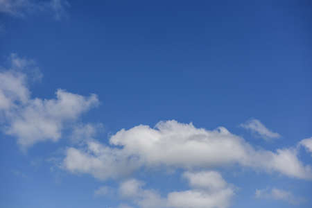 Blue sky background with tiny clouds, clouds in the blue sky