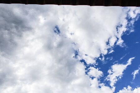 Blue sky background with tiny clouds, clouds in the blue skyの写真素材