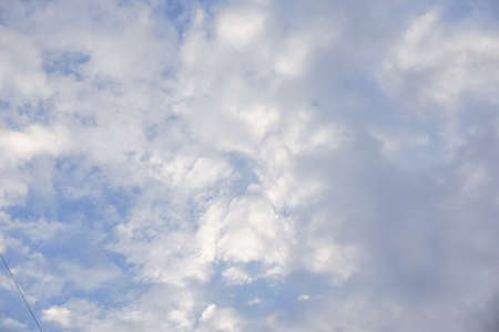 Blue sky background with cloudyの写真素材