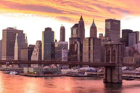 Brooklyn bridge and building in New York city America with Sunset skyの写真素材