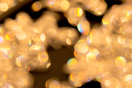 Abstract light gold bokeh with texture backgroundの写真素材