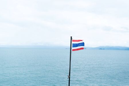 Thailand flag with sea backgroundの写真素材