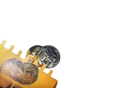 Golden and Silver Bitcoins on Electronics on white background with Clipping pathの写真素材