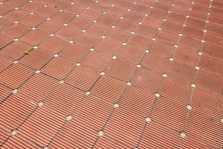 An old tiled floor backgroundの写真素材