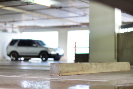 Vacant Parking lot and concrete wheel stop.の写真素材