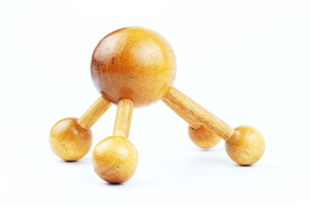 Reflexology Traditional Thai Massage tool, A wooden foot massage on a white background, isolate, wooden foot massage is a folk wisdom that Thai people. Popular Thai massage.の写真素材