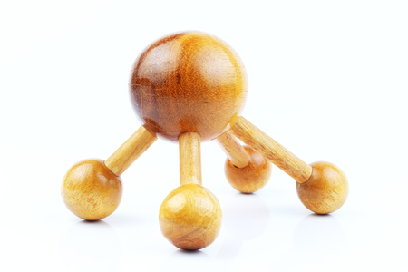 Reflexology Traditional Thai Massage tool, A wooden foot massage on a white background, isolate, wooden foot massage is a folk wisdom that Thai people. Popular Thai massage.の写真素材