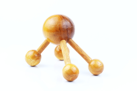Reflexology Traditional Thai Massage tool, A wooden foot massage on a white background, isolate, wooden foot massage is a folk wisdom that Thai people. Popular Thai massage.の写真素材