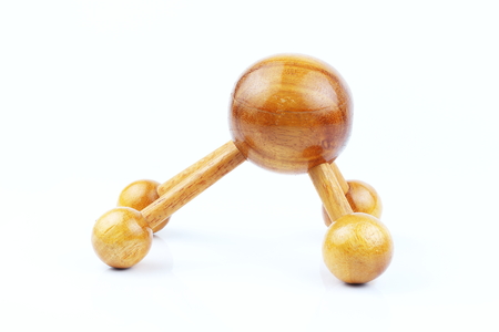 Reflexology Traditional Thai Massage tool, A wooden foot massage on a white background, isolate, wooden foot massage is a folk wisdom that Thai people. Popular Thai massage.の写真素材