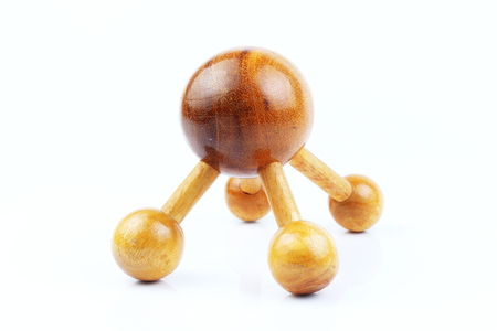Reflexology Traditional Thai Massage tool, A wooden foot massage on a white background, isolate, wooden foot massage is a folk wisdom that Thai people. Popular Thai massage.の写真素材