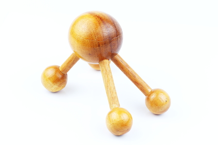 Reflexology Traditional Thai Massage tool, A wooden foot massage on a white background, isolate, wooden foot massage is a folk wisdom that Thai people. Popular Thai massage.の写真素材