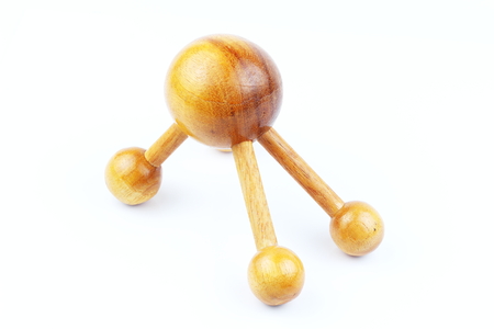 Reflexology Traditional Thai Massage tool, A wooden foot massage on a white background, isolate, wooden foot massage is a folk wisdom that Thai people. Popular Thai massage.の写真素材