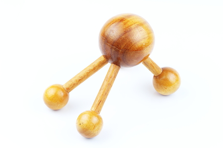 Reflexology Traditional Thai Massage tool, A wooden foot massage on a white background, isolate, wooden foot massage is a folk wisdom that Thai people. Popular Thai massage.の写真素材