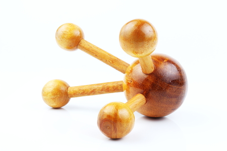 Reflexology Traditional Thai Massage tool, A wooden foot massage on a white background, isolate, wooden foot massage is a folk wisdom that Thai people. Popular Thai massage.の写真素材