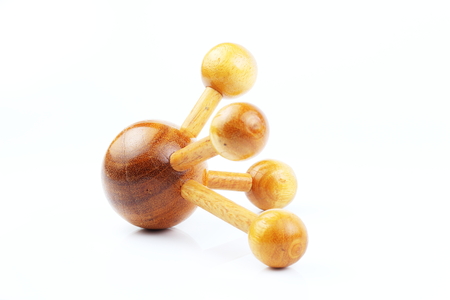 Reflexology Traditional Thai Massage tool, A wooden foot massage on a white background, isolate, wooden foot massage is a folk wisdom that Thai people. Popular Thai massage.の写真素材