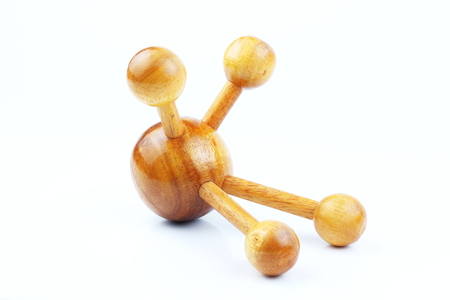 Reflexology Traditional Thai Massage tool, A wooden foot massage on a white background, isolate, wooden foot massage is a folk wisdom that Thai people. Popular Thai massage.の写真素材