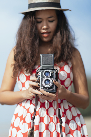 Woman With Vintage Cameraの写真素材