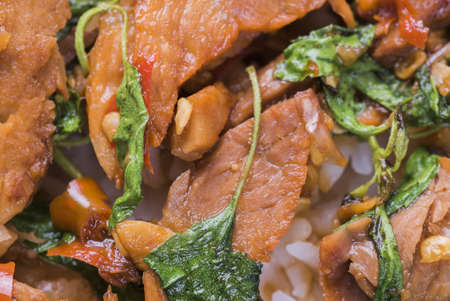 Thai fried pork basil sauce eating with rice.