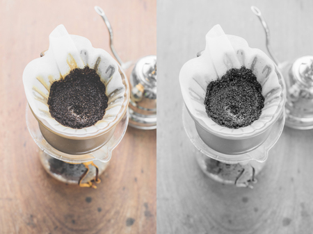 Making brewed arabica coffee from steaming filter drip style. Photo in vintage color tone style.の写真素材