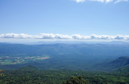 Abstract Blur Wonderful scenery of green moutain with green trees is on the background of blue cloudy sky.の写真素材