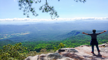 Travel in mountain natural Park blue sky, man backpack enjoying view as for backgroundの写真素材