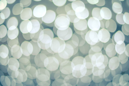 abstract blue Bokeh circles for Christmas backgroundの写真素材