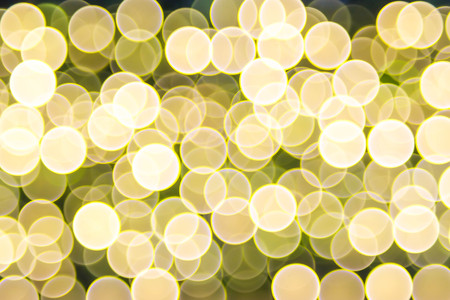 golden and yellow circle bokeh abstract backgroundの写真素材
