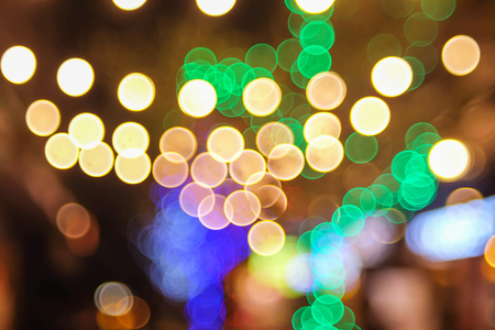 golden and yellow circle bokeh abstract backgroundの写真素材