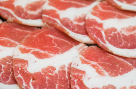 Slice raw pork texture background. Selective focus.の写真素材