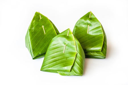 A group of Thai traditional dessert in banana packageの写真素材