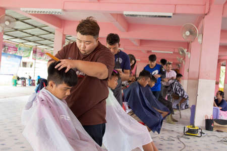 Mukdahan, Thailand, November 13,2019: 
hair cut school came out with a free haircut service for students in the community.のeditorial素材